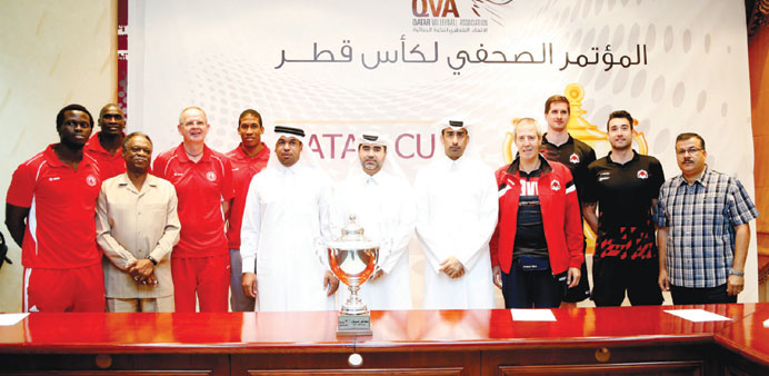 Officials, players and coaches pose with Qatar Cup yesterday. PICTURE: Jayaram