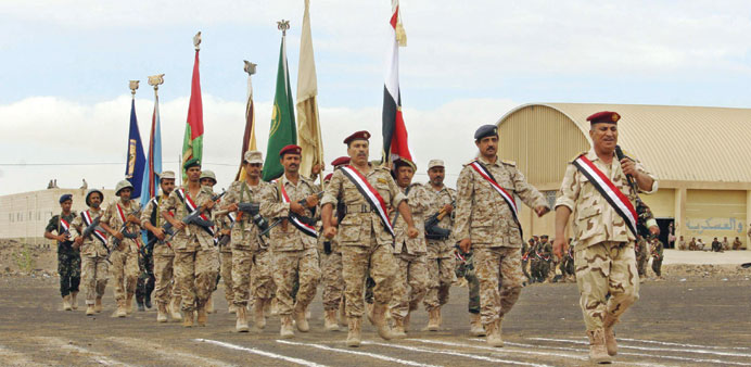  Soldiers loyal to Yemenu2019s President Abd-Rabbu Mansour Hadi march during a parade in Marib province, east of Sanaa, yesterday.