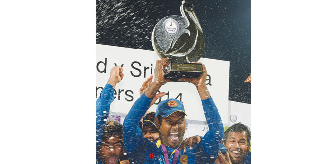 Sri Lanka captain Angelo Mathews (C) celebrates with the series trophy after winning the fifth one-day international match against England at Edgbasto