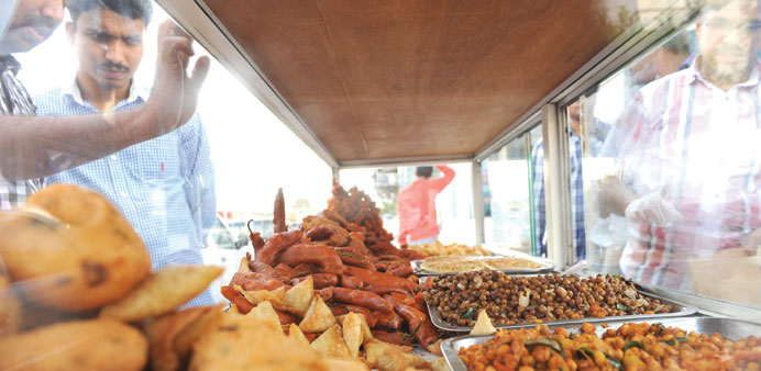Iftar snacks kept for sale at an outlet in Matar Qadeem area of Doha. PICTURE: Najeer Feroke