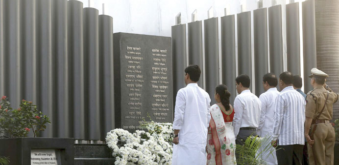 People pay tribute at the Police Gymkhana memorial marking the November 26, 2008 attacks in Mumbai yesterday.