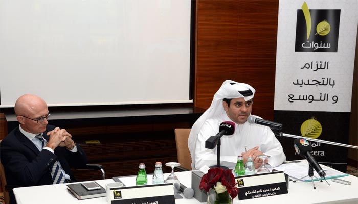 Al Meera deputy CEO Dr Mohamed Naser al-Qahtani speaks at the press conference as CEO Guy Sauvage looks on.