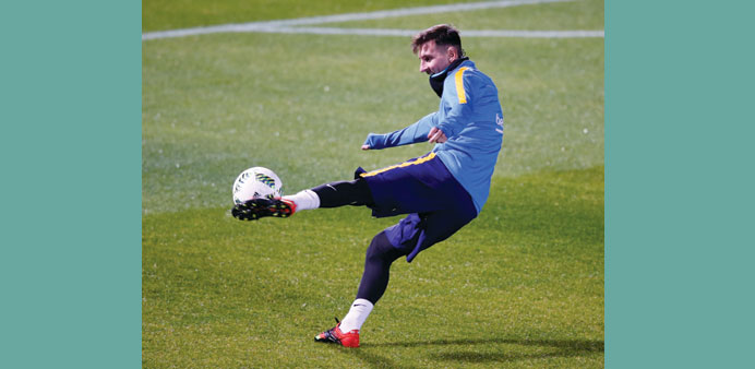 Barcelona player Lionel Messi attends a training session.
