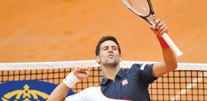   Novak Djokovic celebrates after defeating David Ferrer in the Rome Masters yesterday. (AFP)