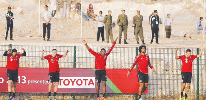 Bayern Munich players warm up during a team training session ahead of their todayu2019s Club World Cup semi-final match against Chinau2019s Guangzhou Evergran