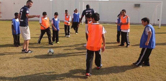 Playing football with Omar Ibn El Khatab students.