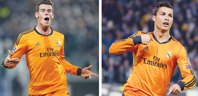 Real Madrid Gareth Bale (L) and Cristiano Ronaldo celebrate after scoring against Juventus during their Champions League match in Turin on November 5.