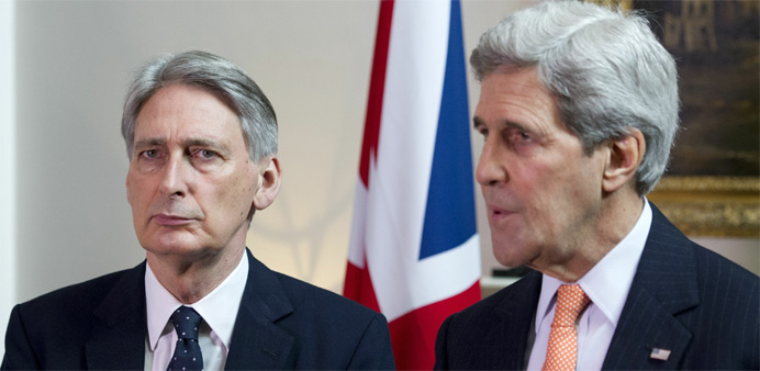US Secretary of State John Kerry (R) and British Foreign Secretary Philip Hammond