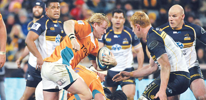 Captain Adriaan Strauss of the Cheetahs makes a run against the Brumbies during their Super Rugby semi-final match in Canberra yesterday. (AFP)