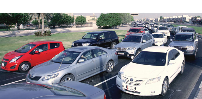 Long lines of vehicles heading towards TV Roundabout from Markhiya roundabout yesterday morning. PICTURES: Nasar T K