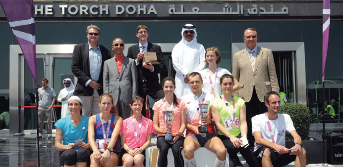 Aspire CEO Khalid Abdullah al-Sulaiteen pictured with the Torch Staircase Run winners.