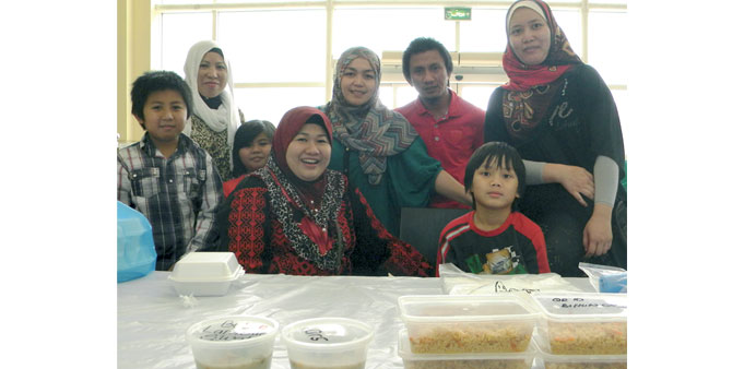 Malaysian traders Liela, Lynn, Nana and Noor with kids and some expatriates. PICTURES: Joey Aguilar