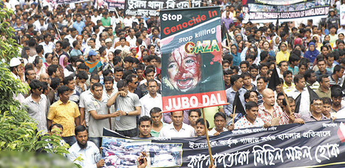 Activists of the BNP-led alliance stage a silent procession in Dhaka against attacks on Gaza.