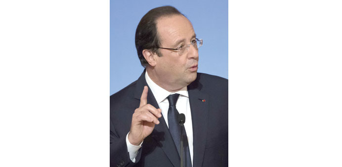 Hollande: speak well of your country.