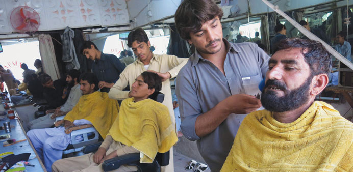 Internally displaced Pakistan civilians fleeing from a military operation against Taliban militants in the North Waziristan tribal agency receive hari