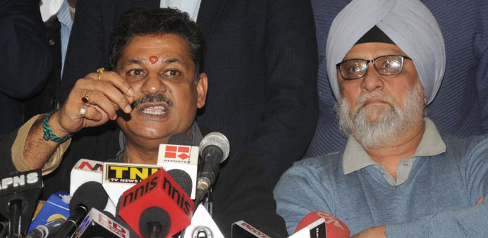 BJP MP and former cricketer Kirti Azad addresses a press conference in New Delhi yesterday.