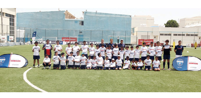 Participants with coaches at the training programme.