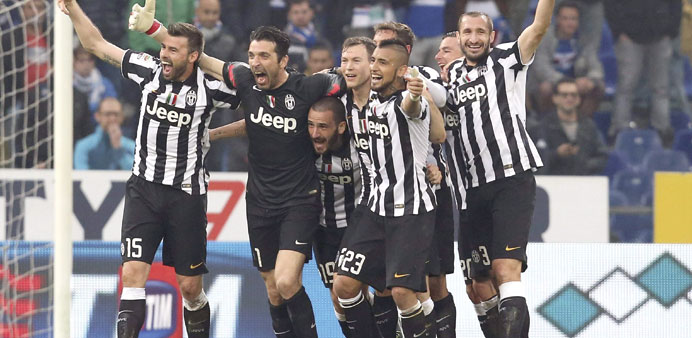 Juventusu2019 players celebrate after winning their fourth successive Serie A crown, and their first under coach Massimiliano Allegri, by beating Sampdori