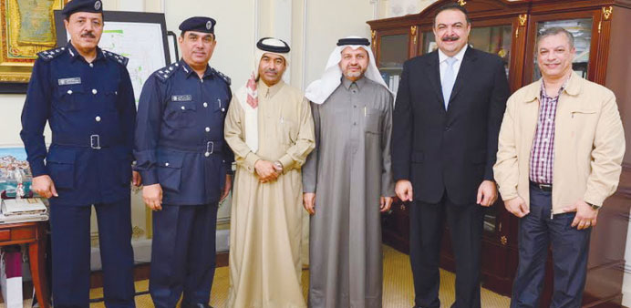    MoI officials with representatives of the CEG after signing the agreement.