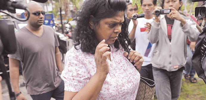 Raji Sukumaran, the mother of Australian death row prisoner Myuran Sukumaran, arrives at Kerobokan Prison to visit her son in Denpasar, Bali yesterday