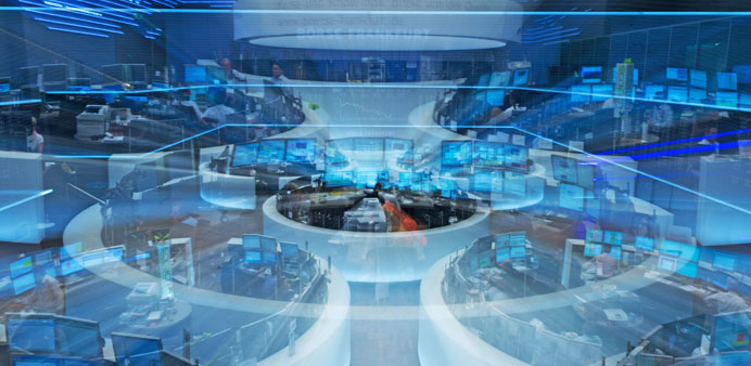 Traders follow the fluctuations in share prices on international financial markets at the stock exchange in Frankfurt/Main yesterday. In Germany, the 