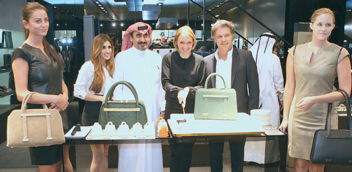 Salman al-Darwish, Heidi Otto, and other officials from Porsche Design at the launch of the TwinBag yesterday. PICTURE: Jayaram