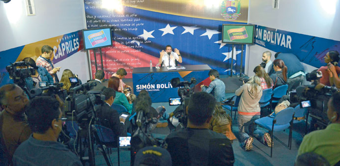  Capriles speaks during a news conference in Caracas on Wednesday.
