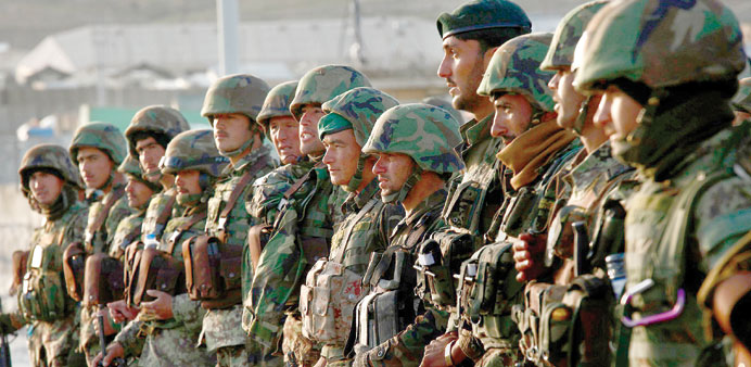   Afghan National Army soldiers get a briefing prior to a mission.