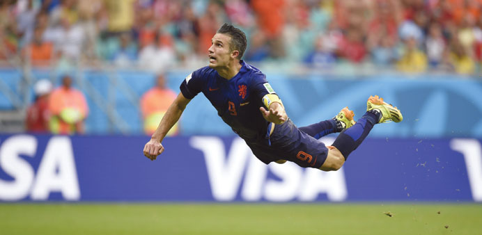 Netherlandsu2019 forward Robin van Persie scores during his teamu2019s Group B opening match against Spain. (AFP)