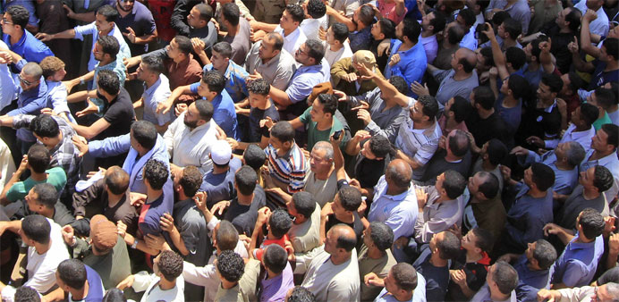 Egyptians at the funeral of first lieutenant Mohamed Ashraf