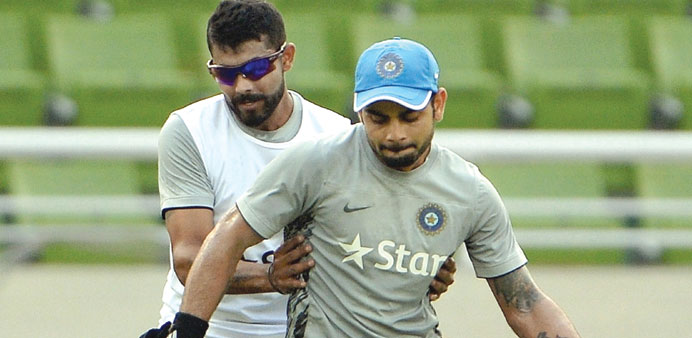 MAN OF THE MOMENT: Virat Kohli (right) and Ravindra Jadeja play a game of football during the Indian teamu2019s training session yesterday. (AFP)