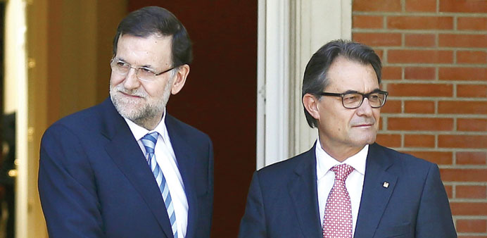 Spanish Prime Minister Mariano Rajoy (left) shakes hands with Catalan president Artur Mas in Madrid.