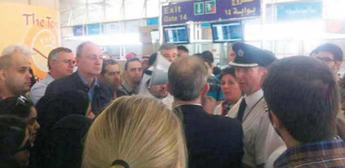 Crew attempt to pacify passengers.
