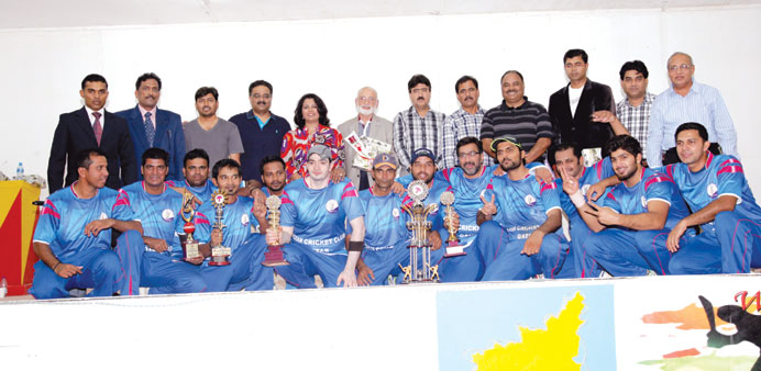 Doha Cricket Club players pose with chief guest MI Farid and other guests.