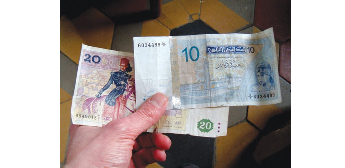 For the past four months, the central bank has permitted a slide of the dinar against both the euro and the dollar