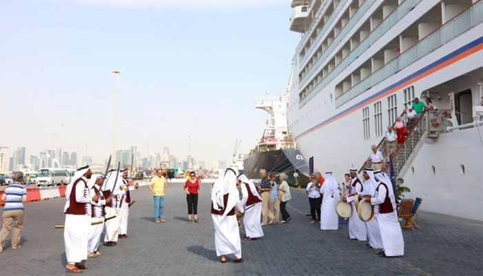 Passengers disembark at Doha Port to a traditional, warm welcome