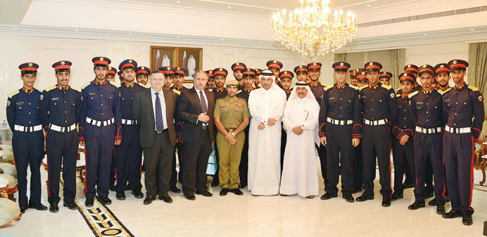 Sheikh Thani bin Saud al-Thani with students of Ahmed Bin Mohamed Military College. 