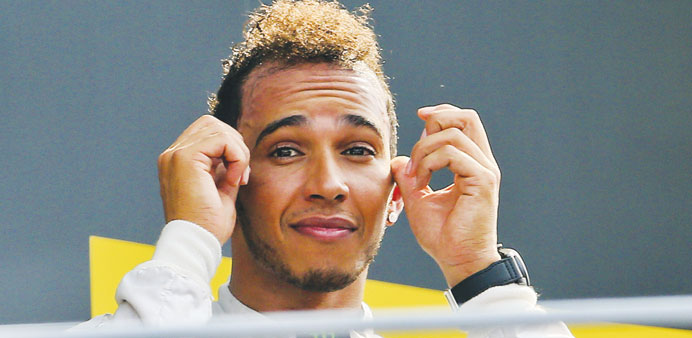 Mercedes driver Lewis Hamilton reacts after winning the Italian Grand Prix in Monza yesterday. (EPA)