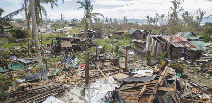 A general shot of houses destroyed by typhoon Koppu in Casiguran town, Aurora province northeast of Manila yesterday, days after the typhoon devastate