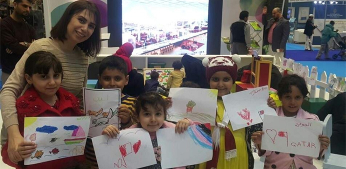 Children enjoy drawing and other fun activities organised by QNL.
