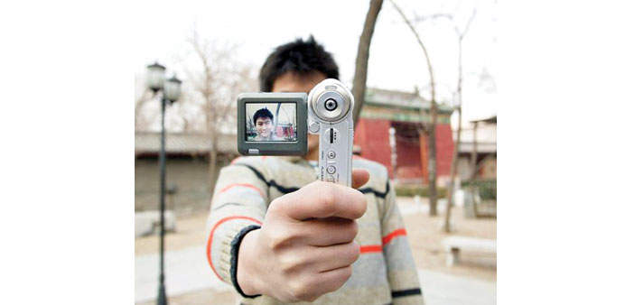 Digital cameras can co-exist with smartphones, say industry experts.
