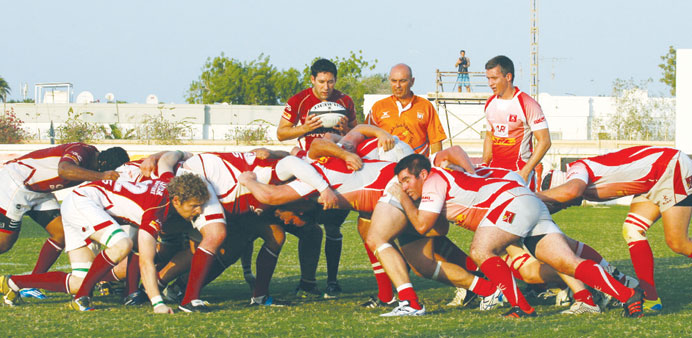 Action from yesterday's Gulf Premiership rugby match between Doha RFC (maroon) and Bahrain RFC (red) at the Doha Rugby Football centre. Doha won 14-10