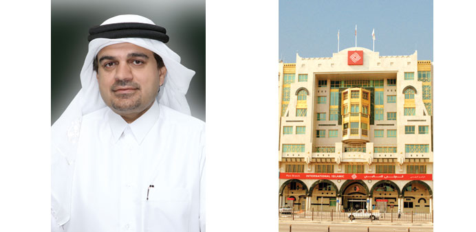 Al-Shaibei: Proud to be in line with national growth. Right: International Islamic corporate office on Grand Hamad Street.