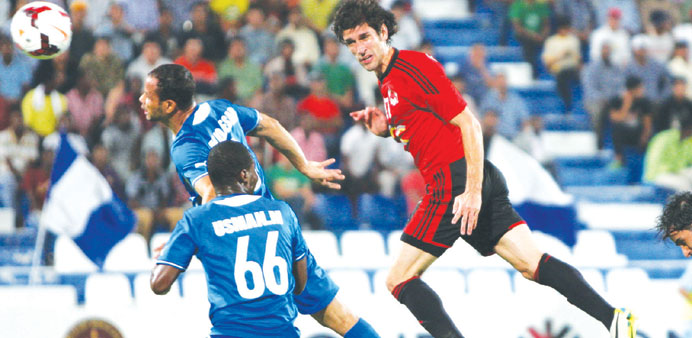 Al Rayyanu2019s Juan Forlin (R) battles for the ball with two Al Khor players in their Qatar Stars League clash yesterday.