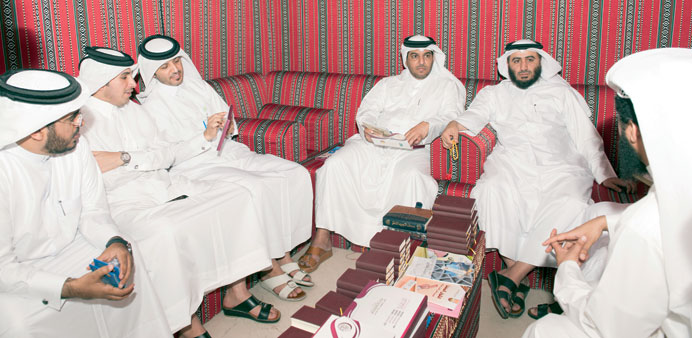 Guests are seen at the Ramadan library tent.