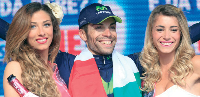 Giovanni Visconti of Italy celebrates on the podium after winning the 17th stage of the 96th edition of the Giro du2019Italia cycling race, from Caravaggi
