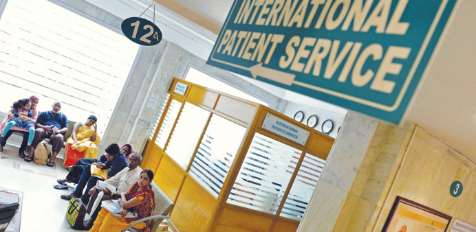 Patients and relatives wait at the Apollo Hospitals, International Patient Service Division, in Chennai.
