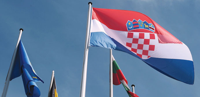 The Croatian flag is raised yesterday during a ceremony for Croatiau2019s accession to the European Union, in the European Parliament in Strasbourg, easte