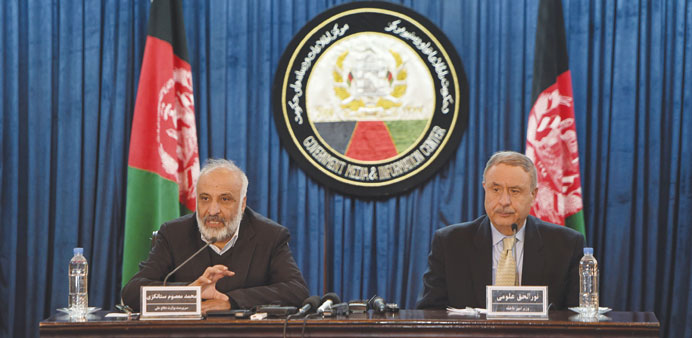 Afghan acting Defence Minister Masoom Stanekzai (left) speaks during a joint press conference with Afghan Interior Minister Noorulhaq Ulomi in Kabul y