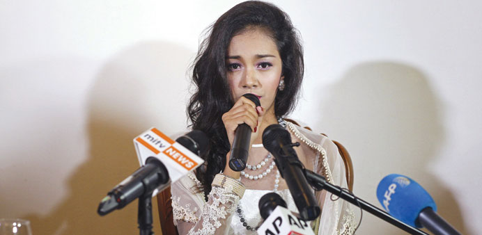 Myanmaru2019s former beauty queen May Myat Noe gives a news conference at a restaurant in Yangon yesterday.